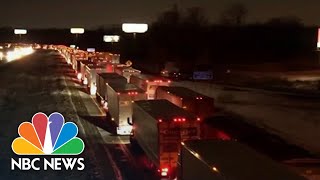 Truckers Block USCanada Border To Protest Mandates Automakers Feel Impact [upl. by Sutphin]