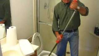 How to Clear a Toilet Clog using a Closet Auger [upl. by Selrahcnhoj469]