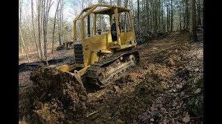 Pushing in a driveway with a bulldozer [upl. by Issirk]