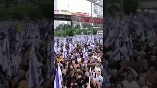 Tens of thousands of protesters in Tel Aviv call for hostage deal [upl. by Esekram]