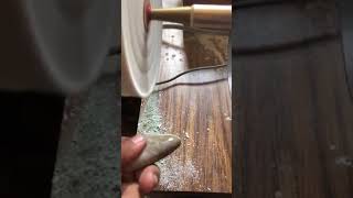 Petoskey Stone polishing on a buffing wheel [upl. by Ellevehc]