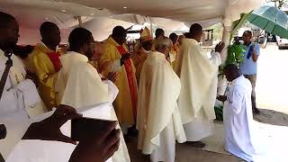 Bishops and Priests laying hands on Fr Gift Sibanda who was ordained [upl. by Nereids]