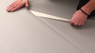 Installation of Harlequin Vinyl performance surface using double sided tape [upl. by Anwat]