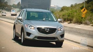 2013 Mazda CX5 Review  Kelley Blue Book [upl. by Ebeohp]