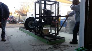 Home made sawmill 1st cut with Wisconsin motor [upl. by Chally28]