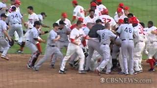 Baseball players brawl during game [upl. by Ellenod]