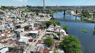 Vista área del Río Ozama y sus barrios periféricos [upl. by Naenaj]