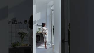 Vertical Video of a Woman Drinking Milk in the Kitchen [upl. by Ardnazil]