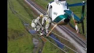 Helicopter Transfering Lineman to Wire [upl. by Divod]