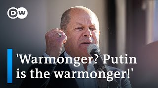 German Chancellor Scholz throws angry response at chants of warmonger  DW News [upl. by Nels]