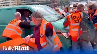 Van driver ploughs through Just Stop Oil protesters in London [upl. by Arytal]