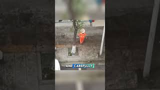 Sanitation worker selflessly collects residents shoes in the rain [upl. by Severin924]