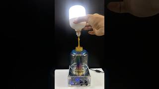 Tesla coil  glass  gold hammer  lamp shorts experiment [upl. by Nabe]