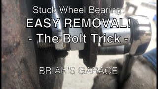 Stuck Wheel Bearing EASY REMOVAL The Bolt Trick [upl. by Anirtak]