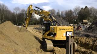 Bagger CAT 328 D mit OilQuick MTS Anbauverdichter und Tiltr [upl. by Geibel]