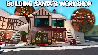 BUILDING SANTAS WORKSHOP AND GIFT WRAPPING IN MY NEW BLOXBURG CHRISTMAS TOWN [upl. by Mckale]