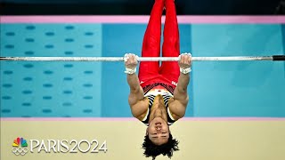 Japans Shinnosuke Oka rises on high bar for third gold medal of the Paris Olympics  NBC Sports [upl. by Enrobso854]