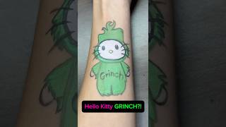 Hello Kitty Grinch😻hellokitty grinch facepainting tattoo makeup painting christmas disney [upl. by Llemej]