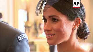 Duke and Duchess of Sussex greet guests at Buckingham Palace [upl. by Eussoj]