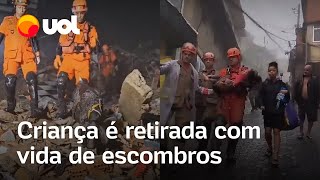 Petrópolis menina de 4 anos é retirada com vida de escombros após pai usar corpo para protegêla [upl. by Crescentia]