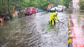 Unclogging Drains to Drain Floods Draining Streets After Heavy Rains [upl. by Favata]