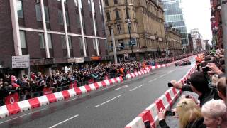 Jenson Button drives McLaren F1 car in Manchester streets Vodafone VIP V8 Sound [upl. by Refiffej]