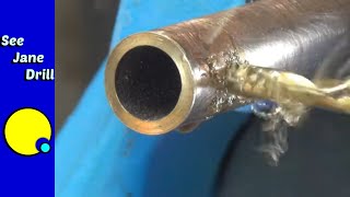 How to Drill a Hole in Stainless STEEL and other TOUGH materials [upl. by Huesman]