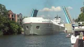 Manitowoc Great Lakes Freighter Navigates Narrow Channel In Manistee Michigan [upl. by O'Donoghue682]