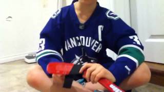 How to tape a mini hockey stick [upl. by Airehc]