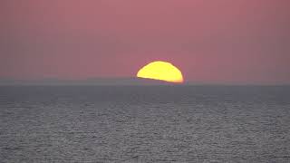 Sunset behind the island of Vis filmed from Lastovo [upl. by Alexandra]