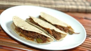 Shredded beef tacos in pasilla chili pepper sauce Mexican food [upl. by Einafets]