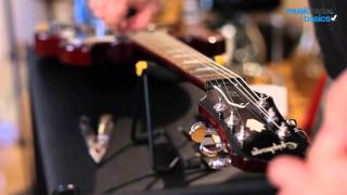 MusicRadar Basics how to restring an electric guitar [upl. by Rehpinnej]