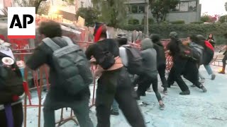 Six officers injured as protesters clash with police outside Israeli embassy in Mexico [upl. by Eiromem]