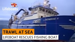 Lifeboat rescues large fishing vessel in rough seas [upl. by Almire549]