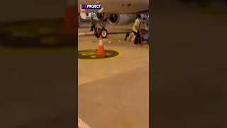 Shocking moment airport workers falls out of a plane after stairs are moved away by another worker [upl. by Danica586]