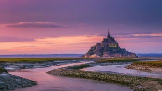 MONTSAINTMICHEL ARCHITECTURAL SPLENDOR AMIDST TIDAL WONDERS [upl. by Kennard]