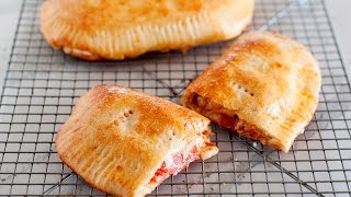 Easy Pizza Pockets Recipe  Homemade Calzones [upl. by Ahsinrat778]