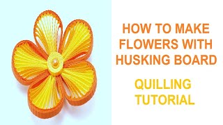 How to make flowers using a quilling husking board [upl. by Kamilah]