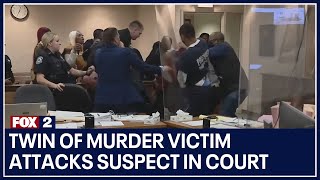 Twin of murder victim attacks suspect in court after seeing evidence video [upl. by Oicul948]