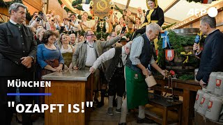 quotOzapft isquot  Münchner Oktoberfest ist eröffnet  AFP [upl. by Ennovad783]