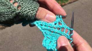 Picking up a dropped YO two rows down knitting [upl. by Nhojleahcim]