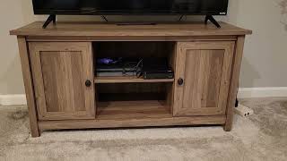 Sauder County Line Panel TV Stand Salt Oak finish [upl. by Kenley]