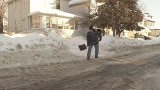 Shoveling tip to stop snow from blocking driveway [upl. by Hsevahb]