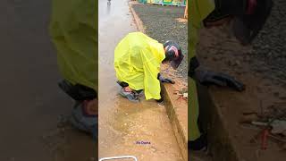 Blockage removing debris out of this drain drainage satisfying cloggeddrain flood flashflood [upl. by Neeliak359]