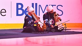 Canadian national anthem sung in Punjabi at Winnipeg Jets game during South Asian Heritage night [upl. by Oicnoel]