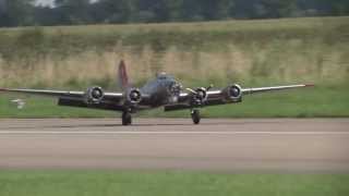 A huge B17 quotFlying Fortressquot  escorted by a Spitfire a Corsair a P47 Thunderbolt and an AT6 [upl. by Enirok]