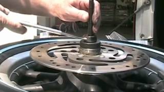 Harley Davidson Wheel Bearing Change and Tire Informationavi [upl. by Serolod]