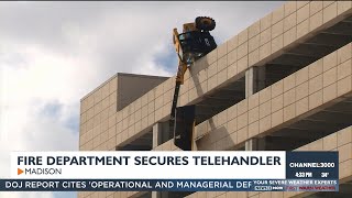 Madison firefighters secure telehandler that nearly fell off of parking ramp [upl. by Arihppas]