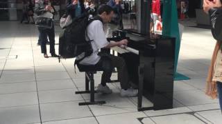 Random passenger playing GOT opening song at Lille Flandres Station during the Euro 2016 [upl. by Nomla]