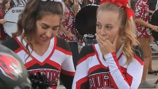 Football players kind gesture to cheerleader goes viral [upl. by Halyk479]